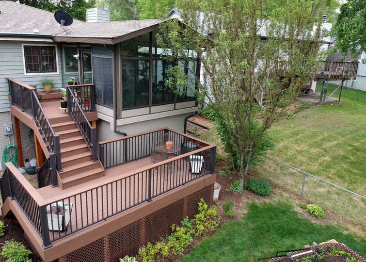 A composite decking house with a patio.