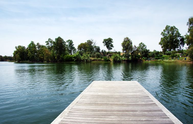 A floating dock situated near a body of water.