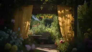 An archway with yellow curtains leading into a garden.