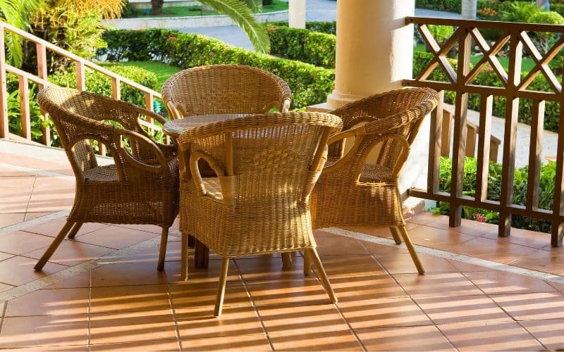 A balcony rattan coffee table and chairs.