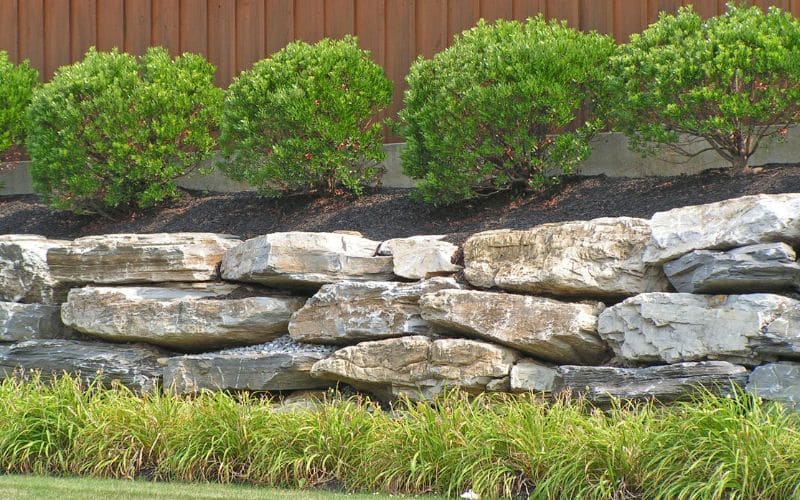 Discover the Magic of Boulder Retaining Walls