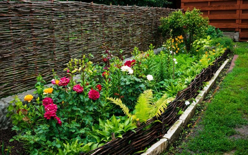 Innovative DIY garden edging ideas using repurposed materials